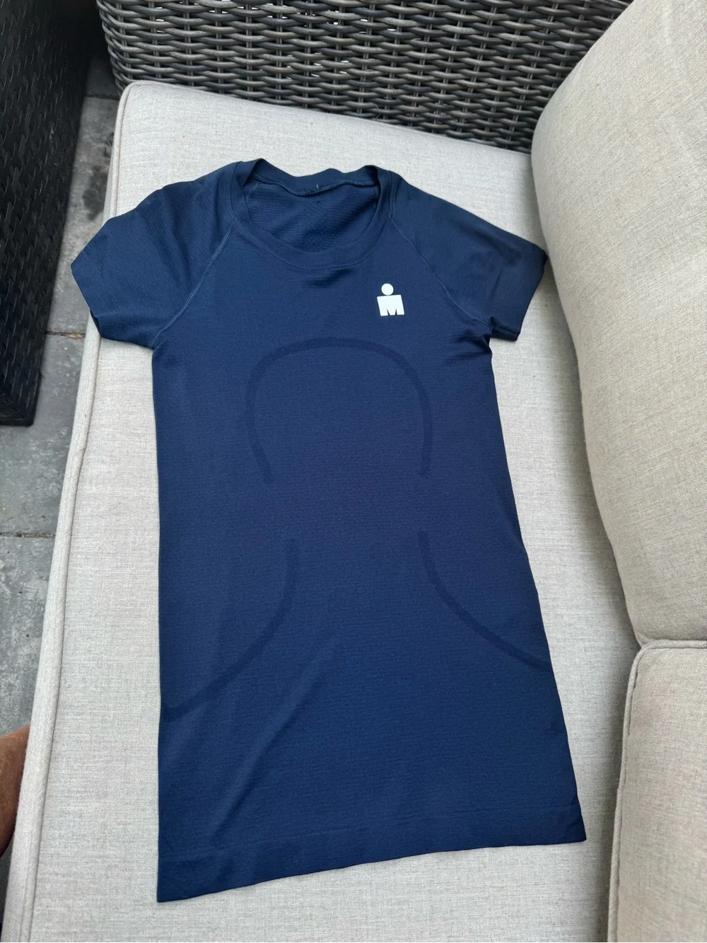 Navy Athleta shirt with White Ironman Logo